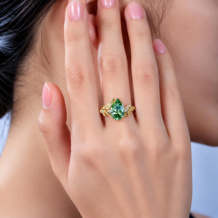 Pear cut lab grown green diamond engagement ring
