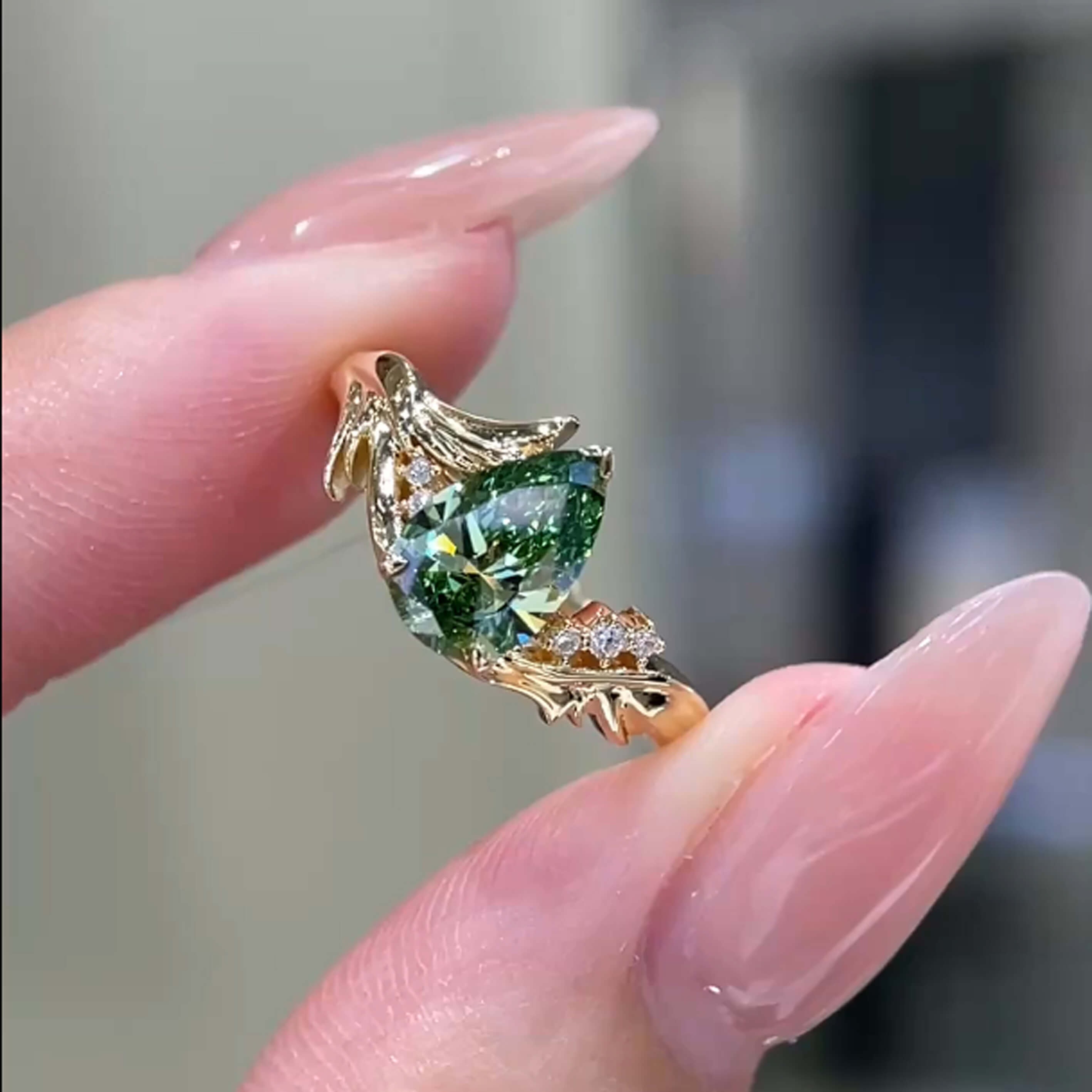 Pear cut lab grown green diamond engagement ring