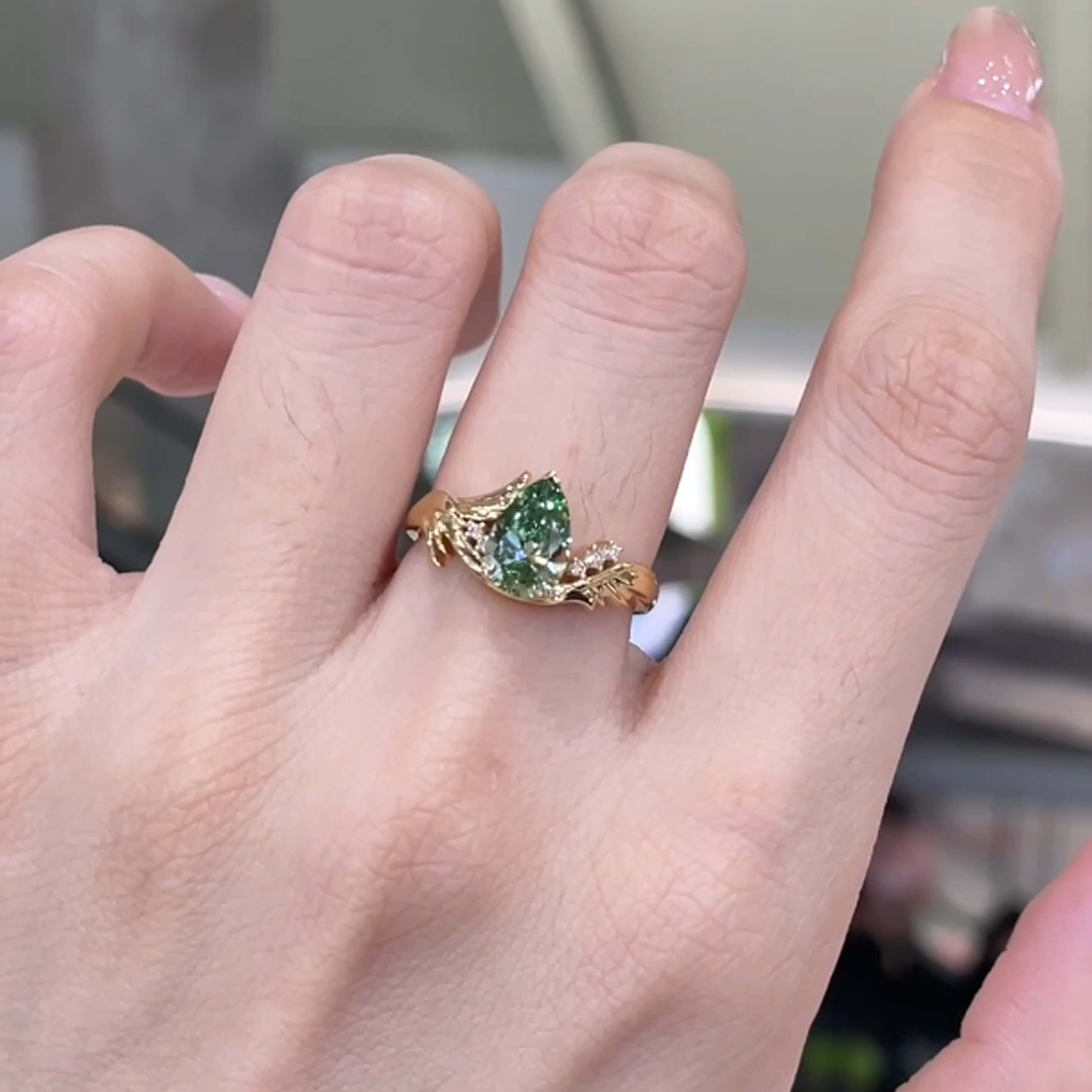 Pear cut lab grown green diamond engagement ring
