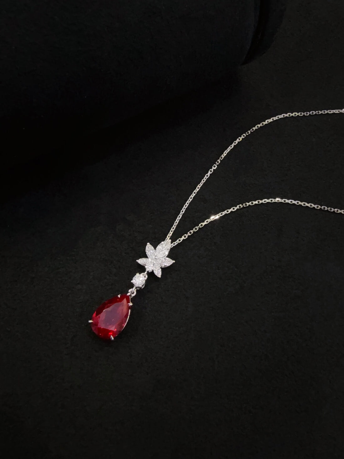 Pear cut lab grown ruby pendant necklace