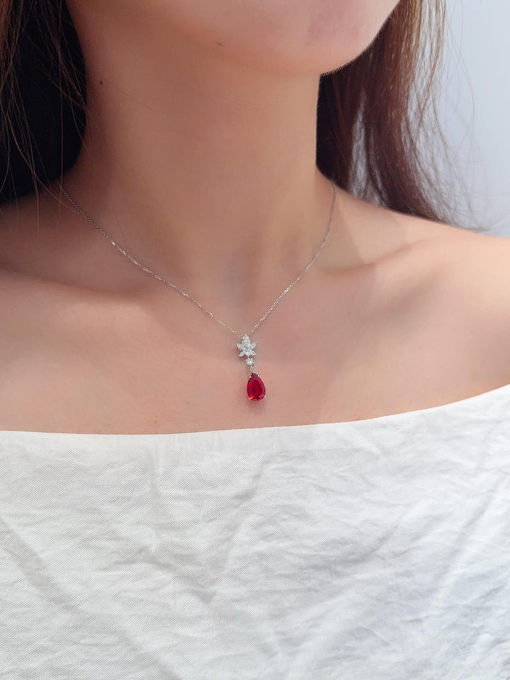 Pear cut lab grown ruby pendant necklace