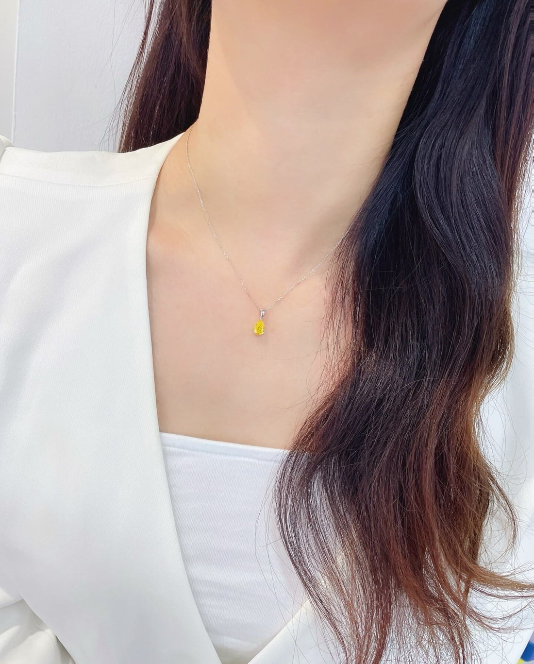 Pear cut lab grown yellow diamond pendant necklace