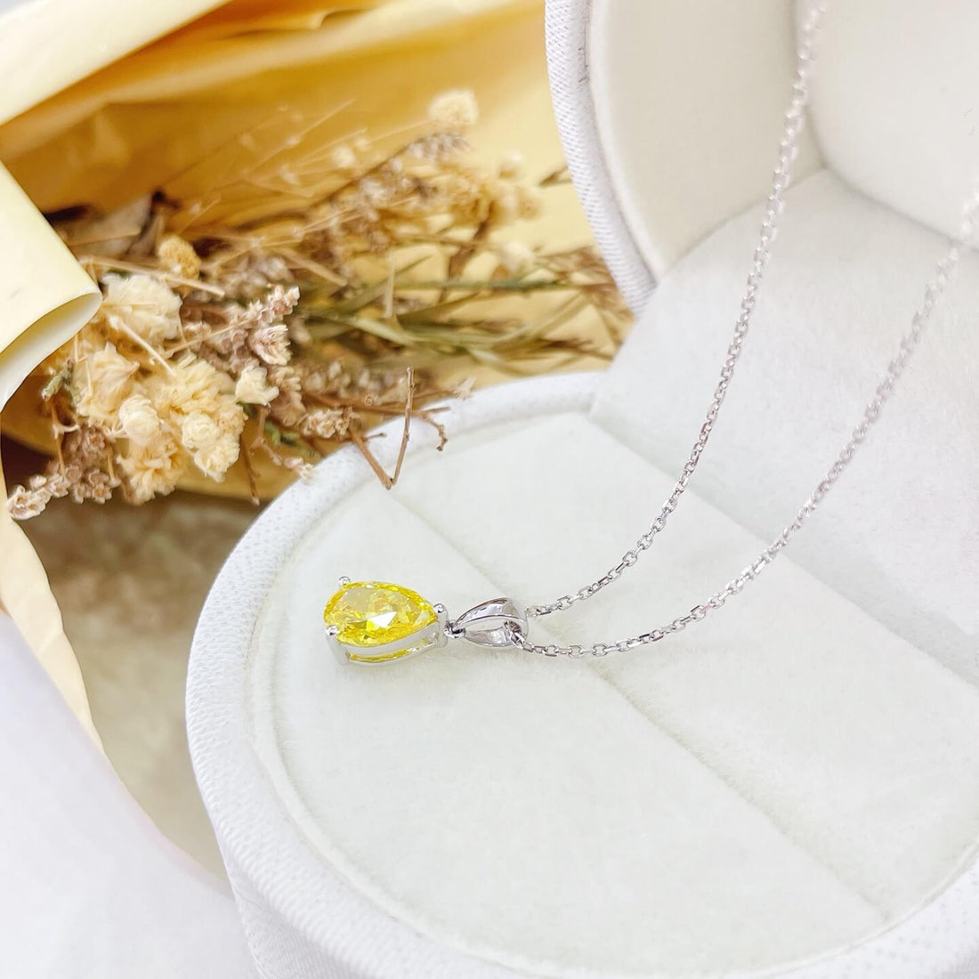 Pear cut lab grown yellow diamond pendant necklace