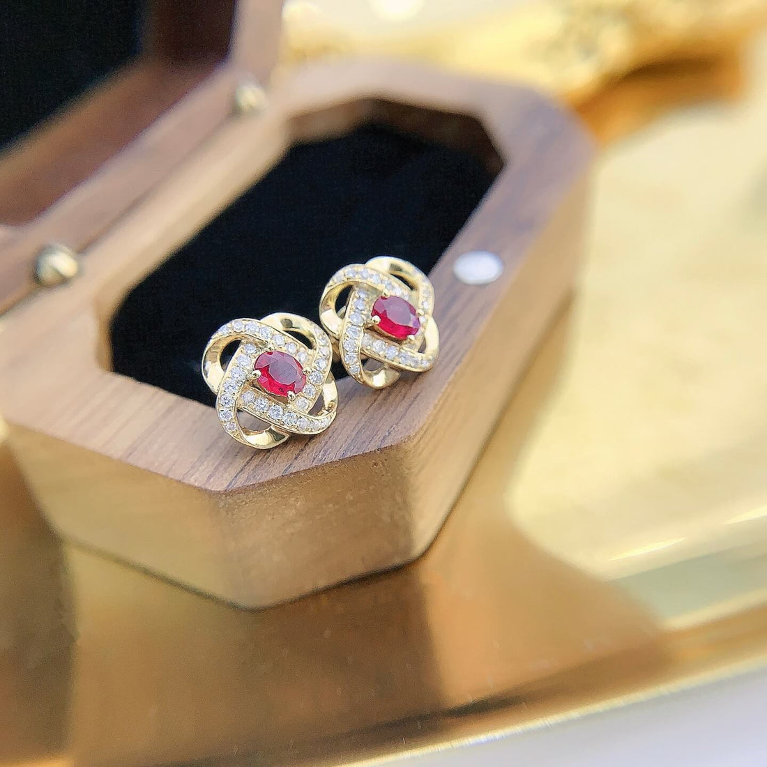 Planet orbit design oval cut lab grown ruby earrings stud