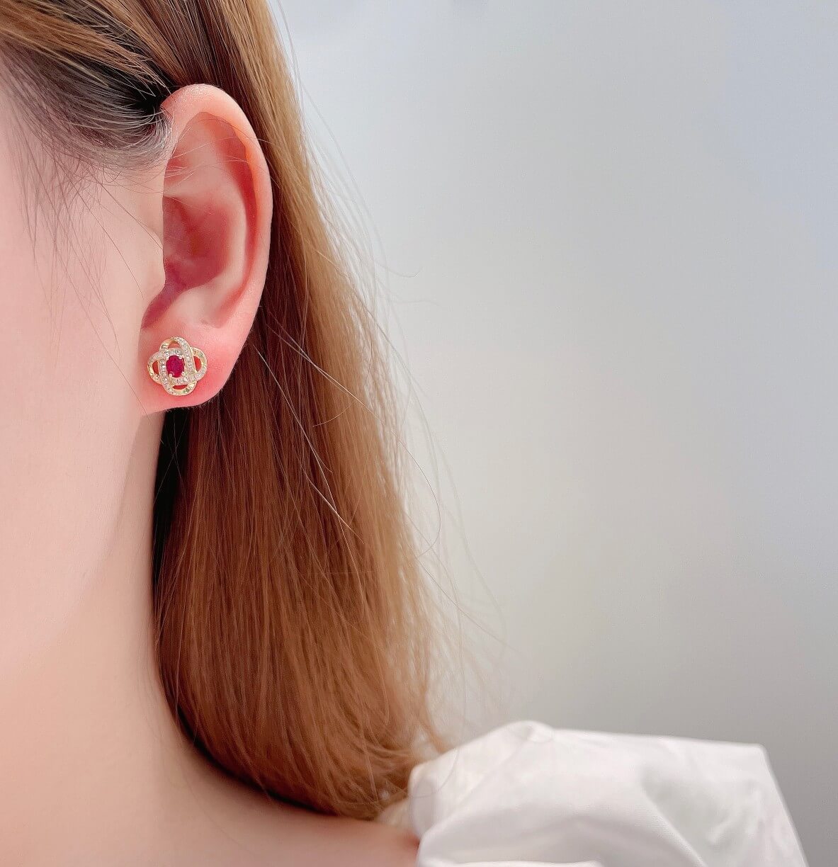 Planet orbit design oval cut lab grown ruby earrings stud