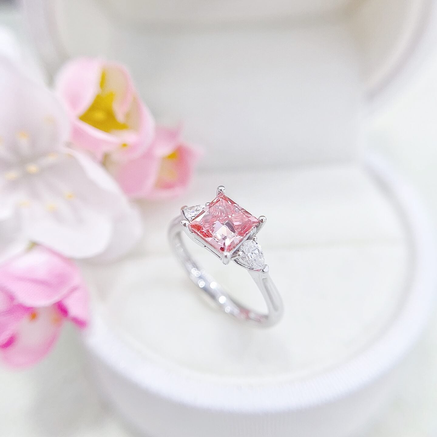 Princess cut lab grown pink diamond three stones engagement ring