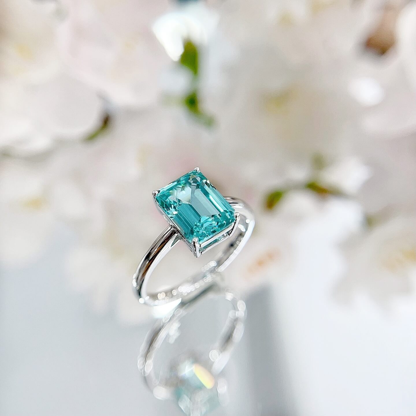 Radiant cut  lab grown Paraiba engagement ring