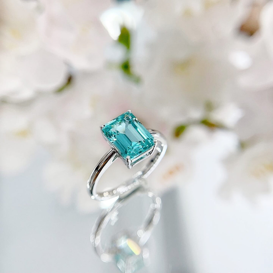 Radiant cut  lab grown Paraiba engagement ring