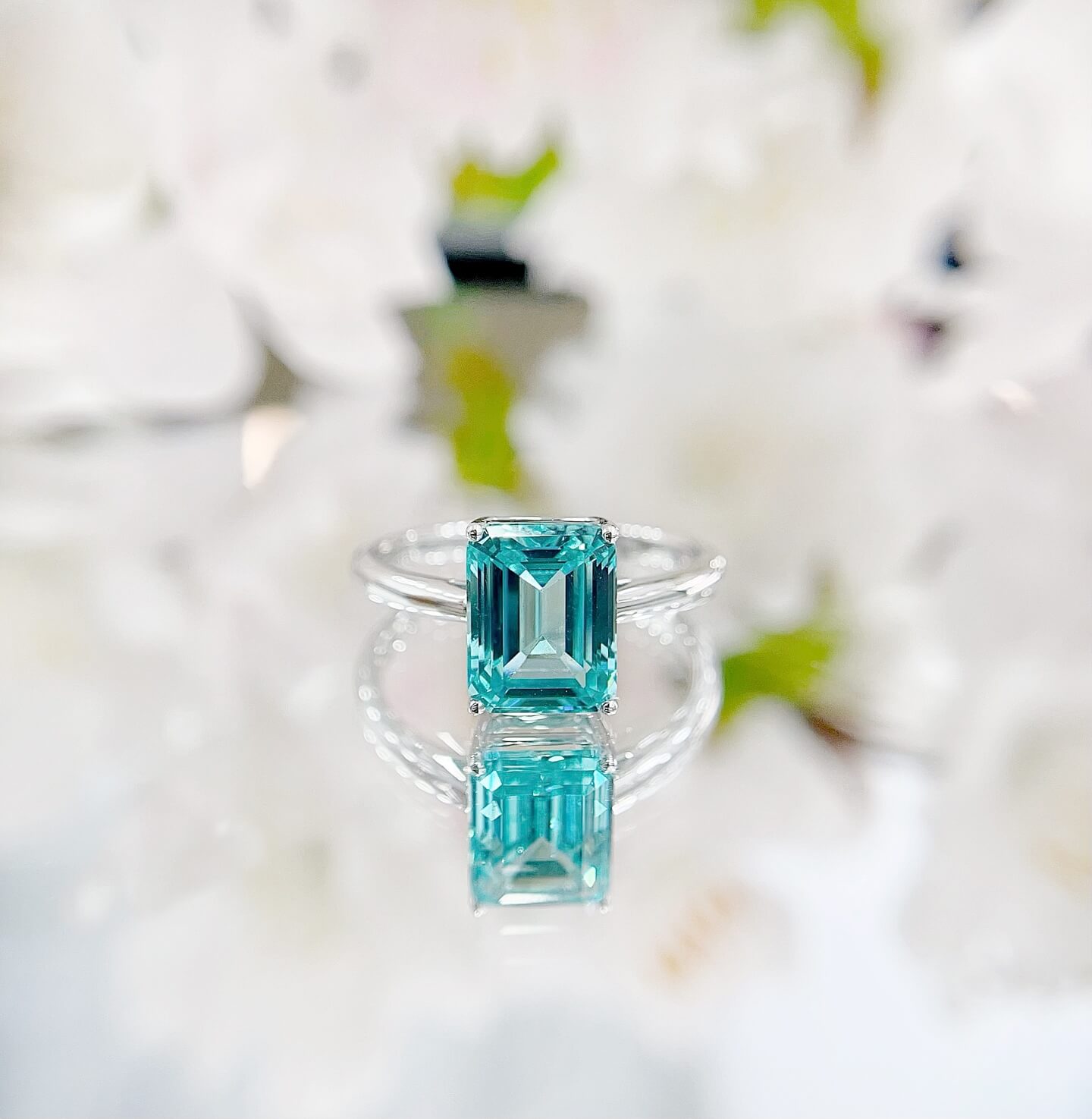 Radiant cut  lab grown Paraiba engagement ring