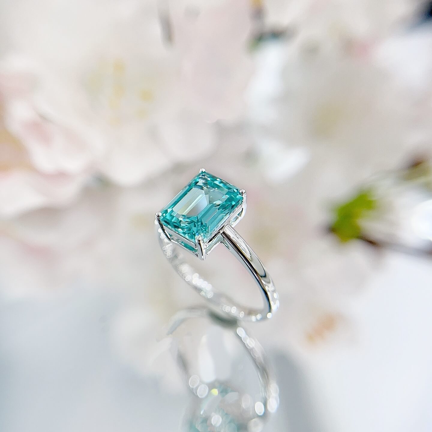 Radiant cut  lab grown Paraiba engagement ring