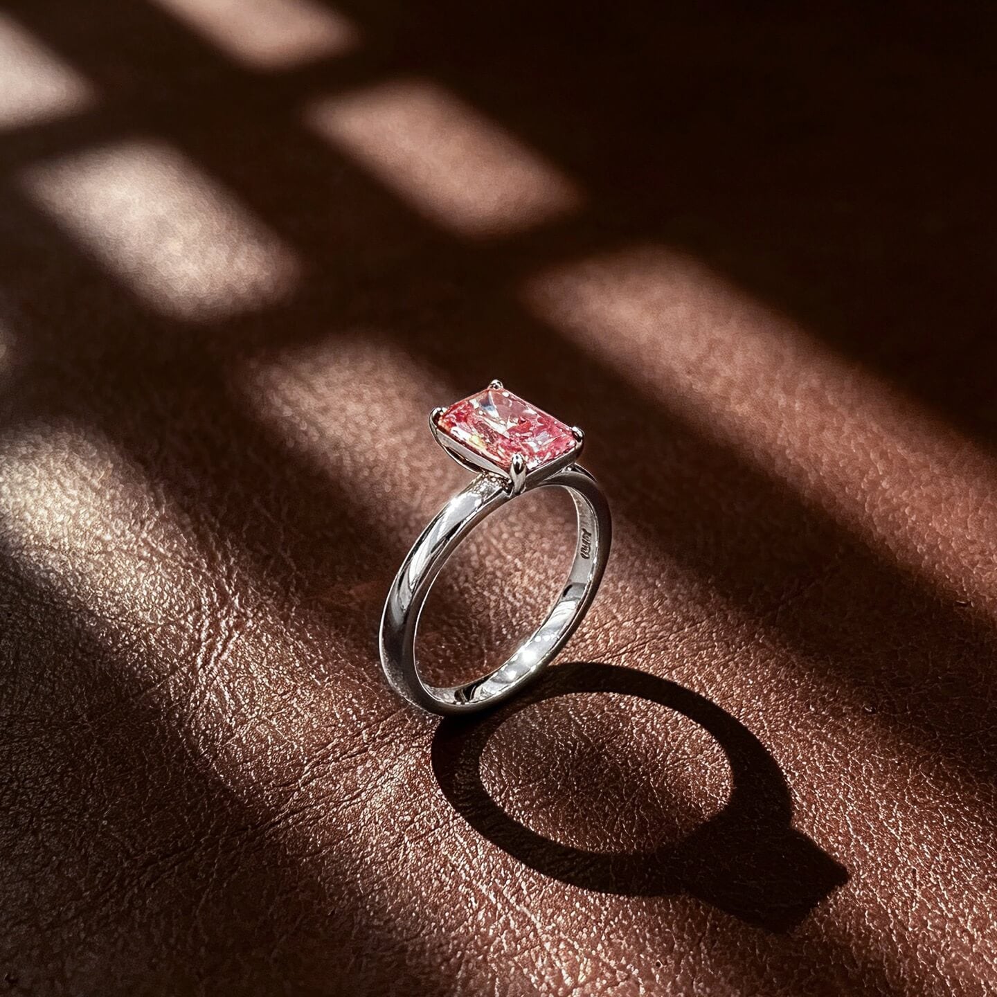Radiant cut lab grown pink diamond engagement ring