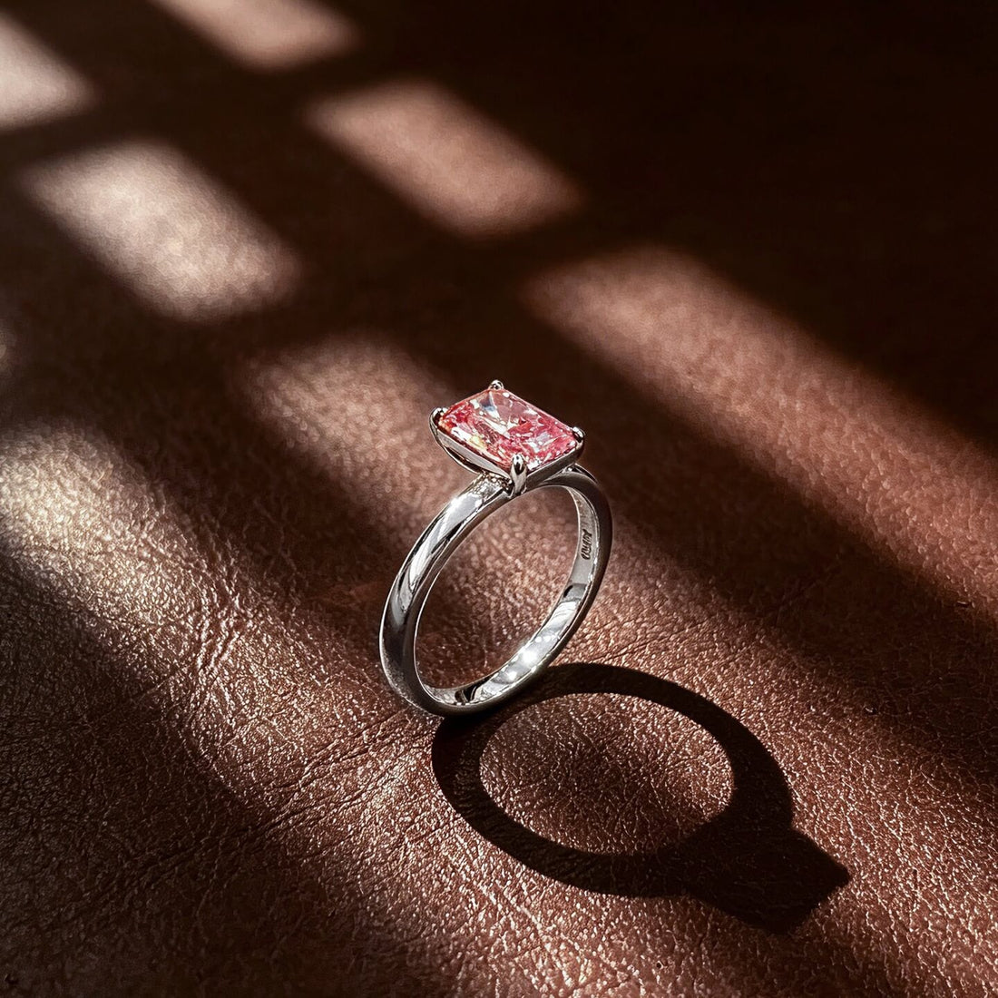 Radiant cut lab grown pink diamond engagement ring
