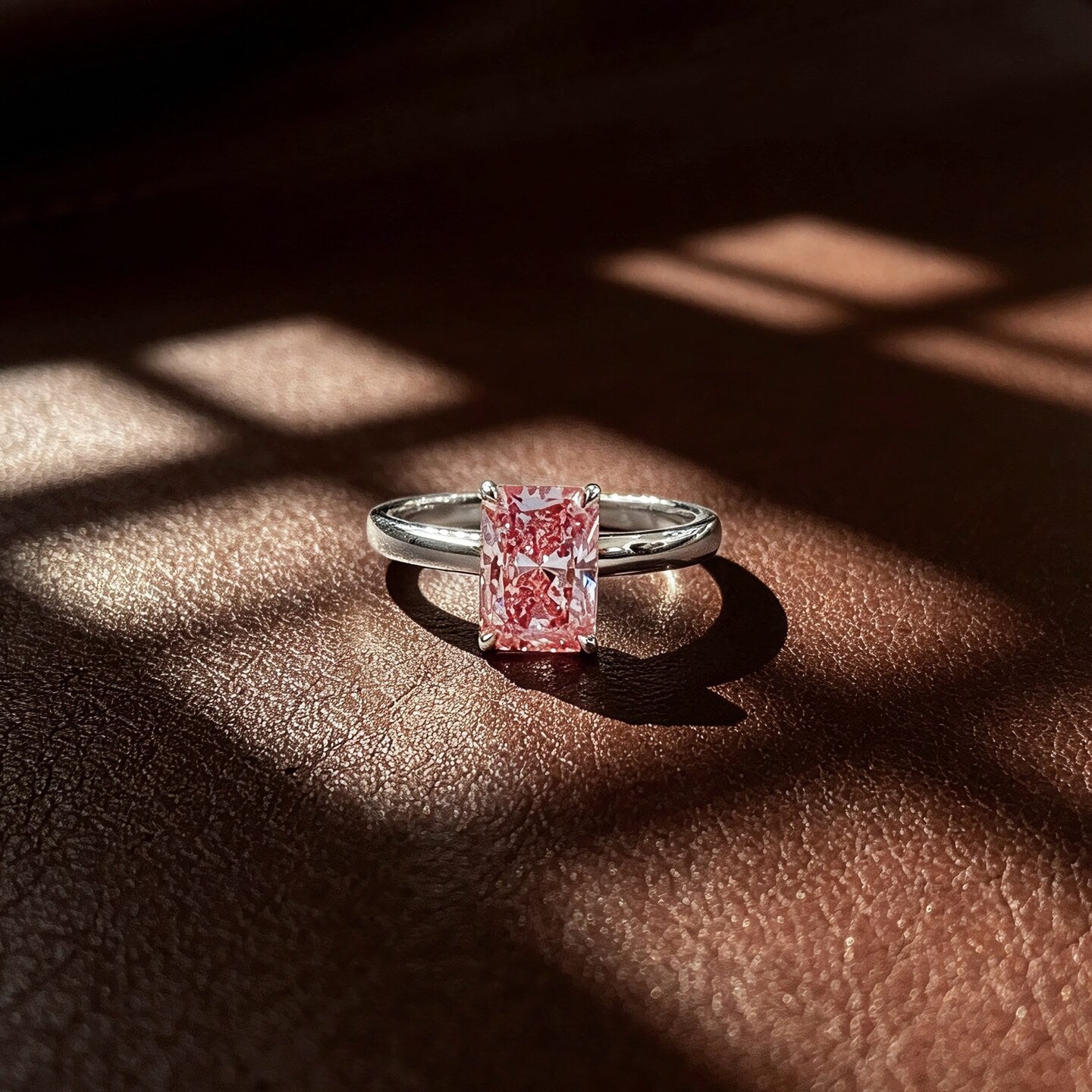 Radiant cut lab grown pink diamond engagement ring