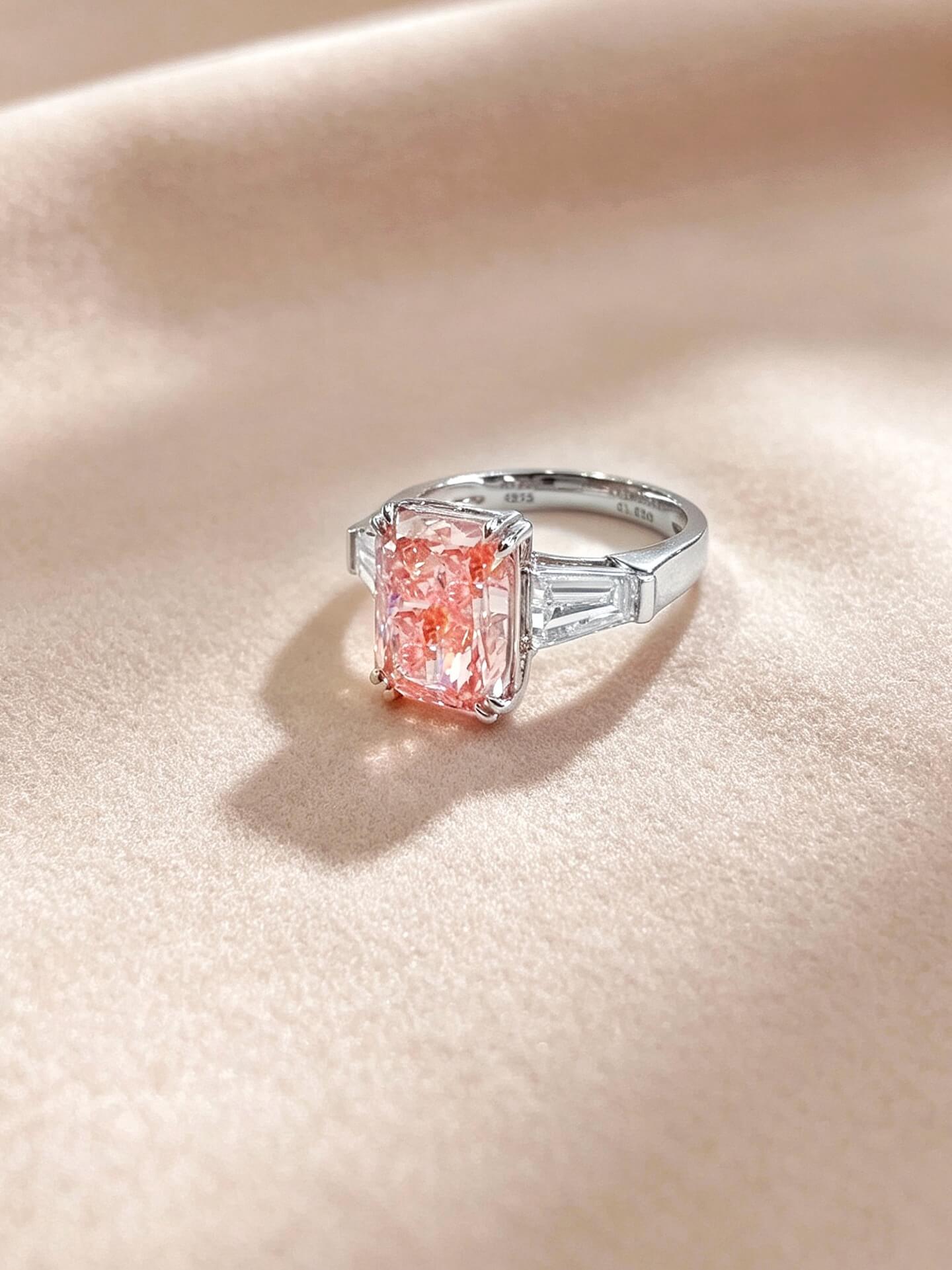 Radiant cut lab grown pink diamond three stones engagement ring
