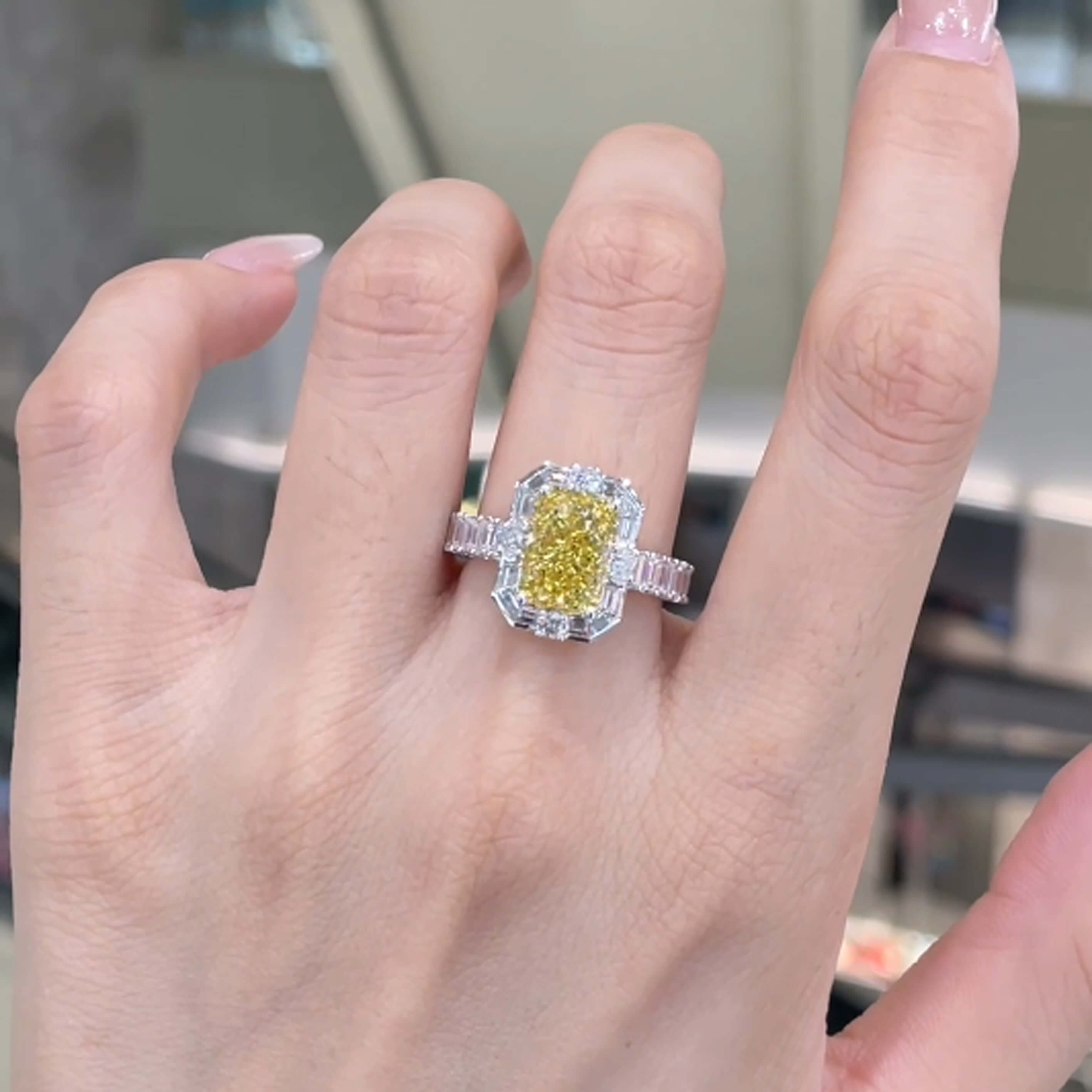Radiant cut lab grown yellow diamond engagement ring