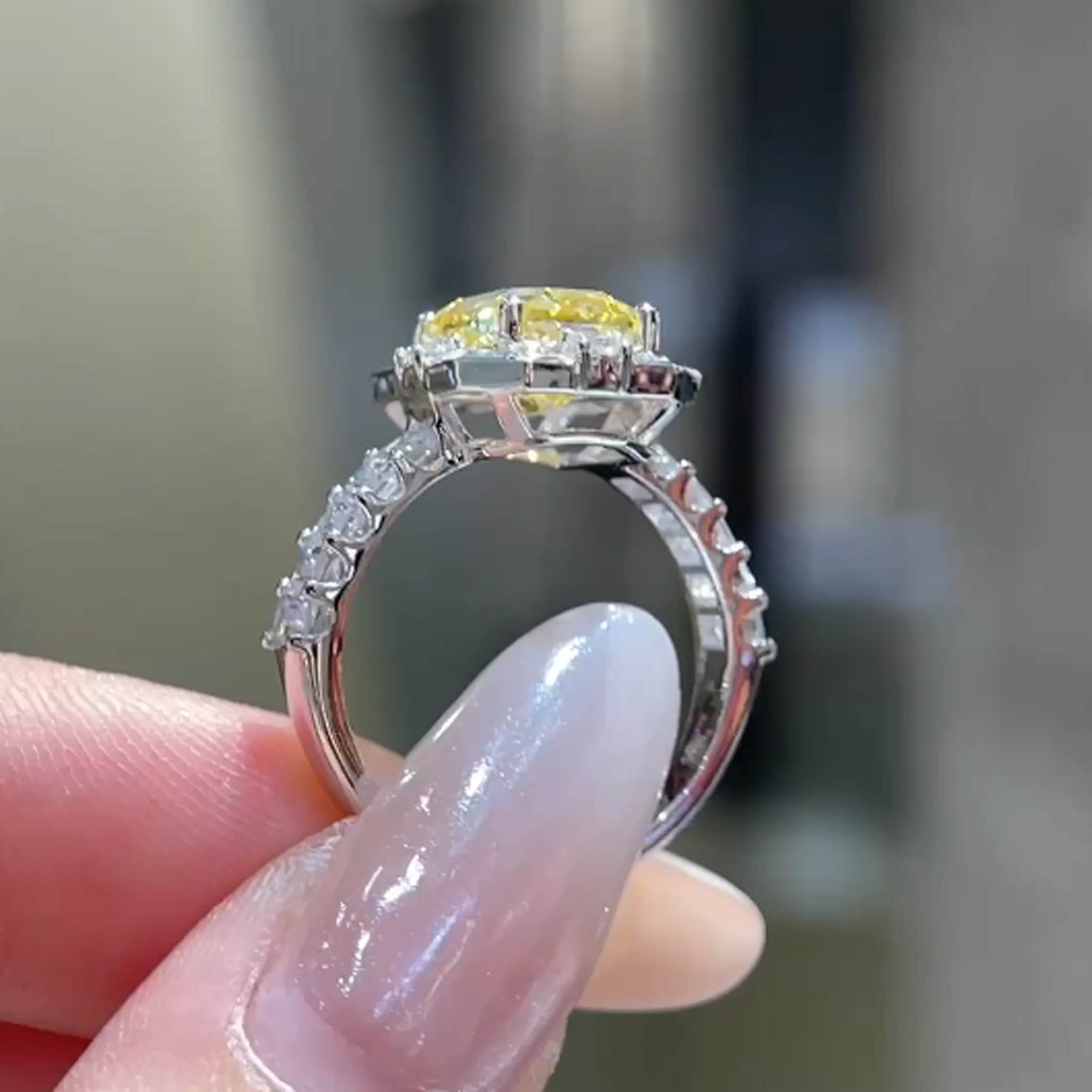 Radiant cut lab grown yellow diamond engagement ring