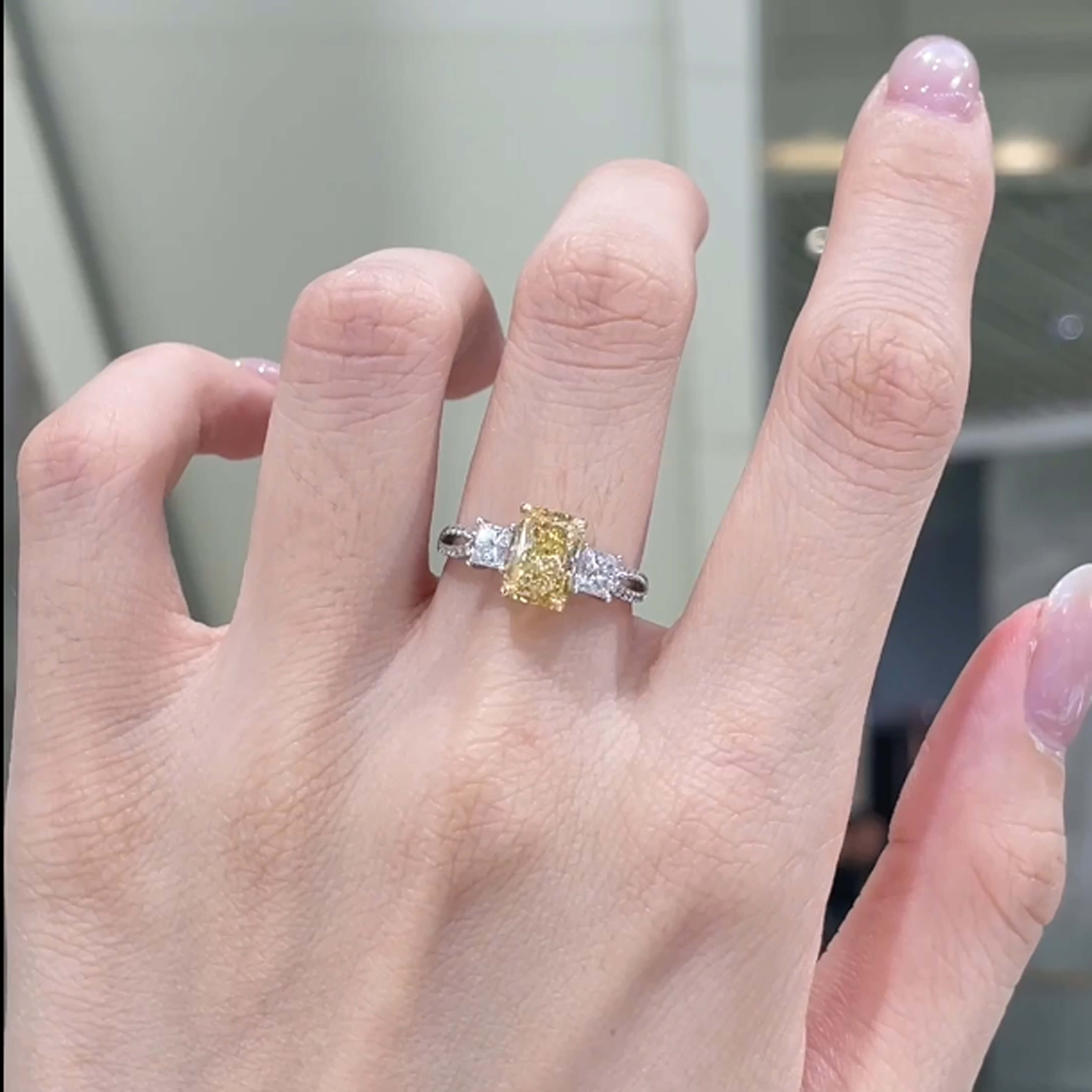 Radiant cut lab grown yellow diamond three stones engagement ring