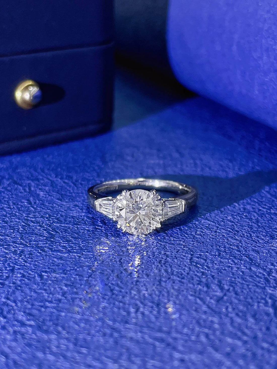 Round cut lab grown diamond three stones engagement ring
