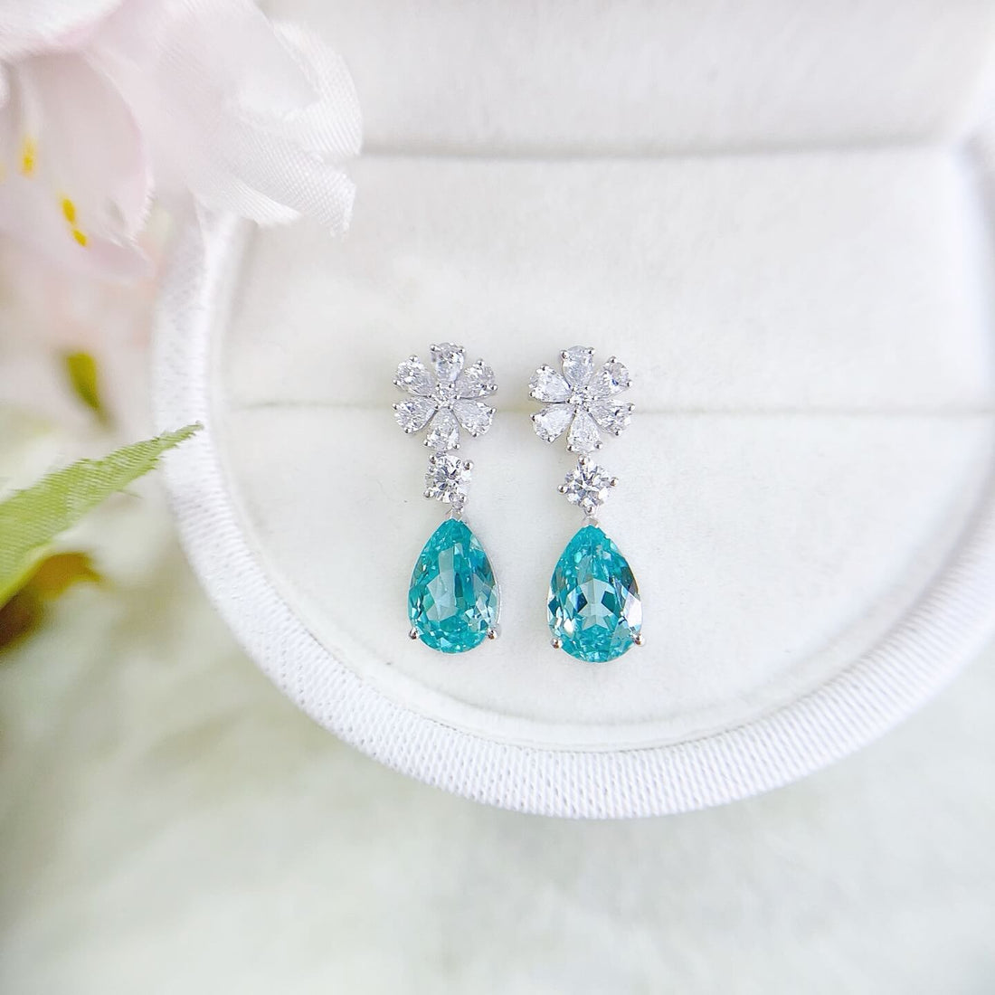 Snowflake design pear cut lab grown Paraiba earrings stud