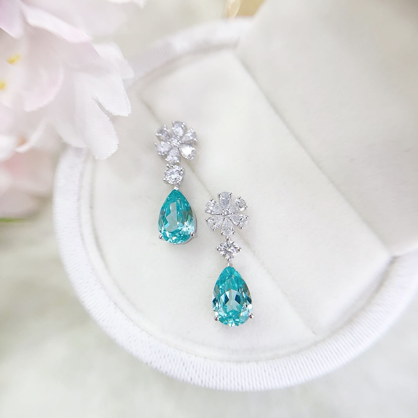 Snowflake design pear cut lab grown Paraiba earrings stud