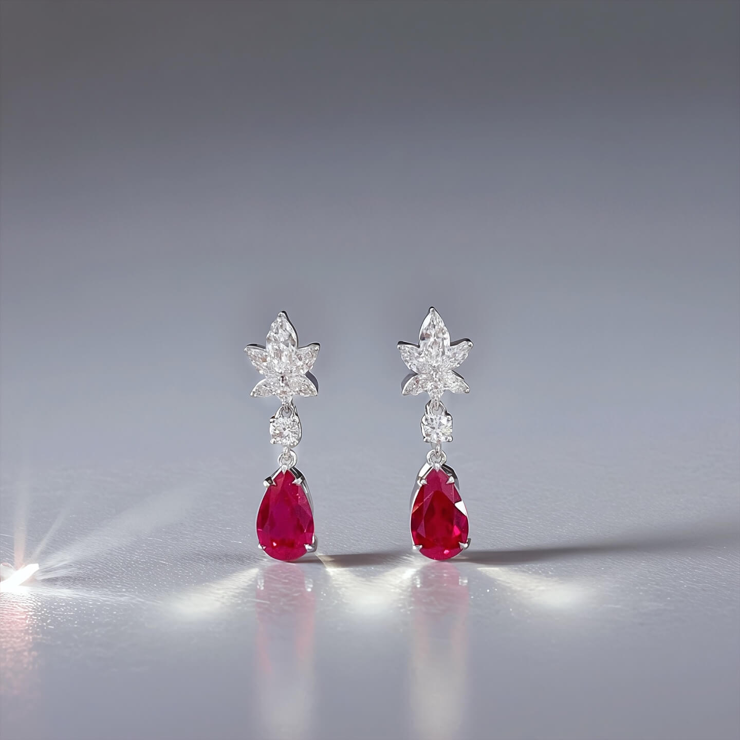 Snowflake design pear cut lab grown ruby earrings stud