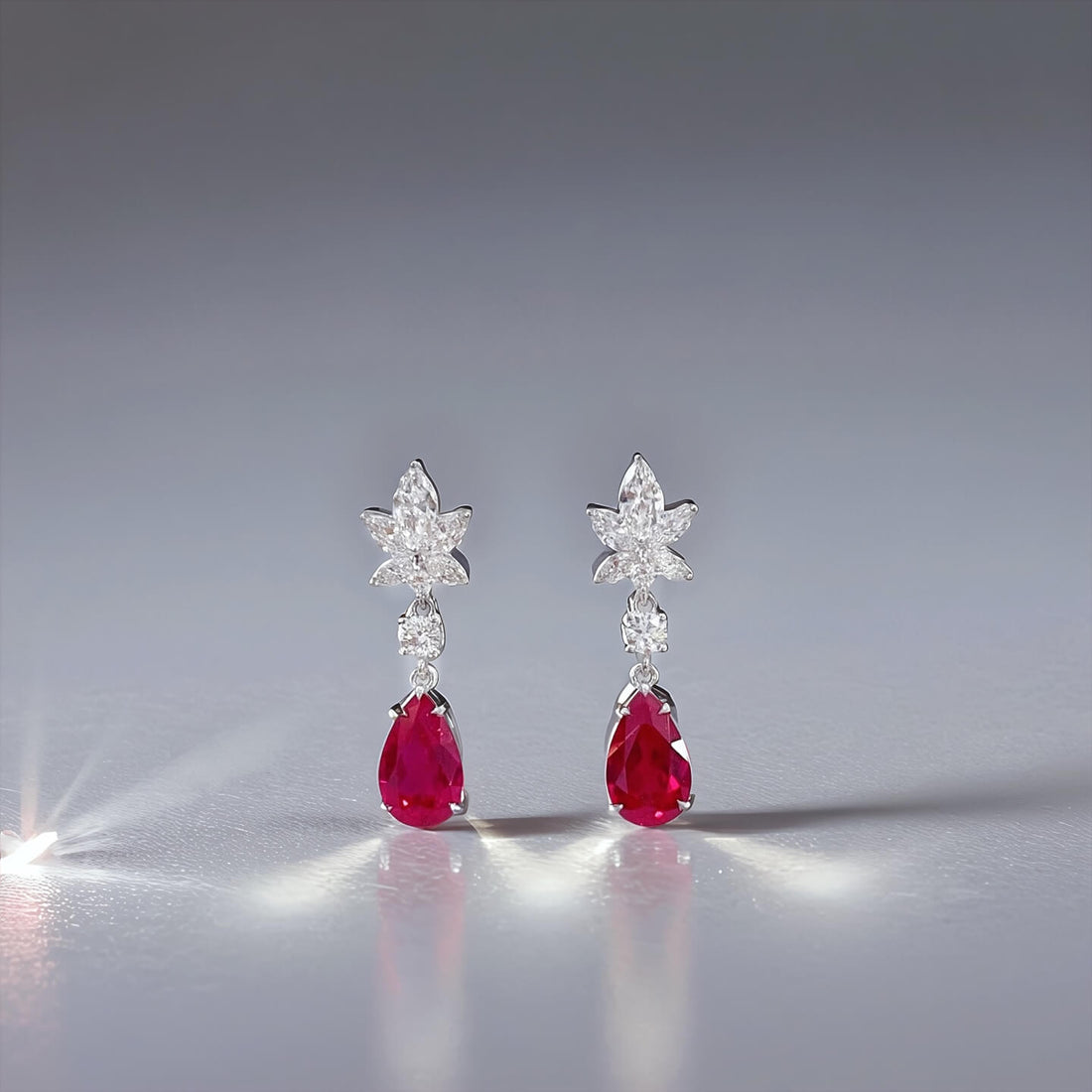 Snowflake design pear cut lab grown ruby earrings stud