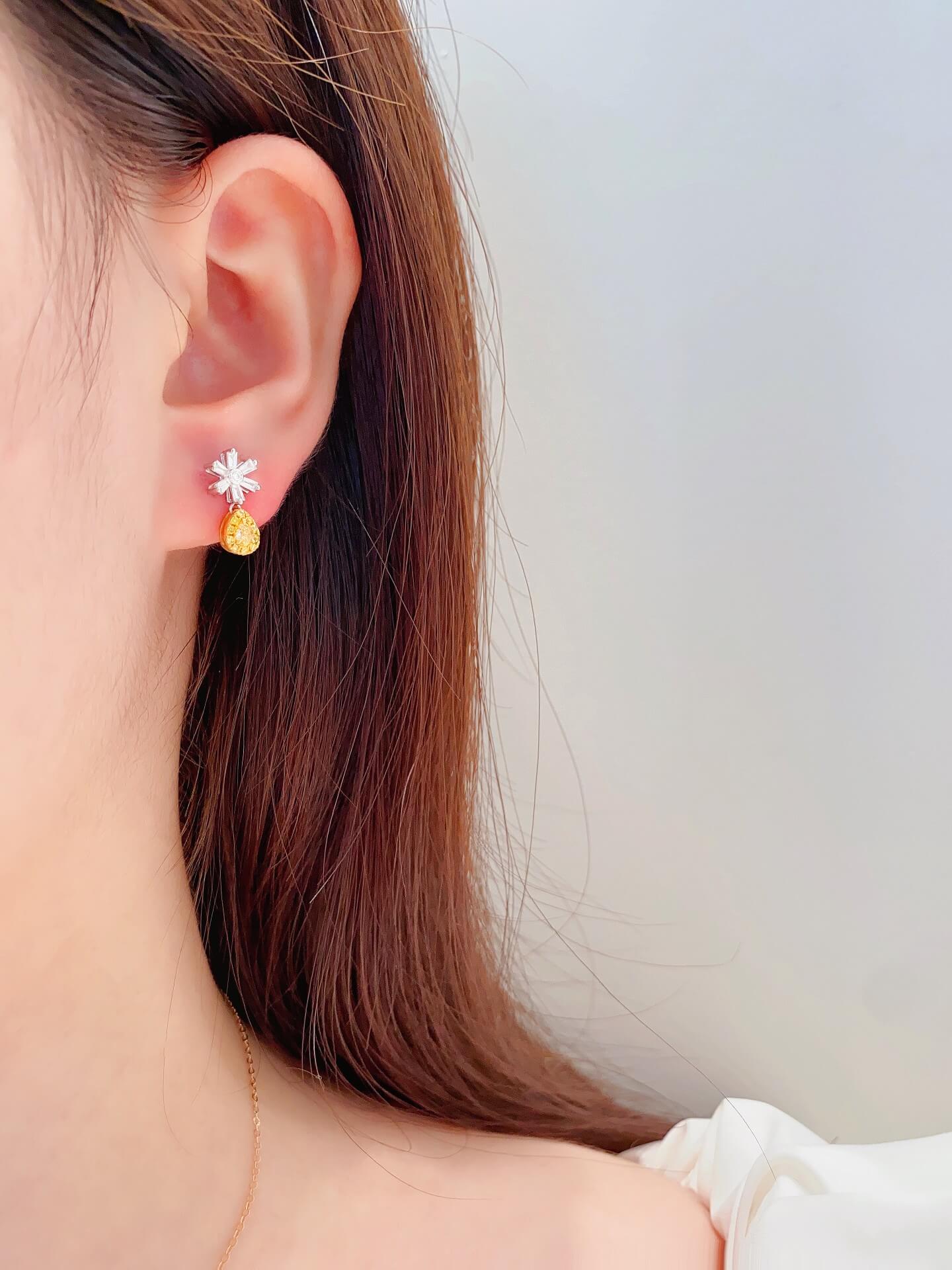 Snowflake design pear cut lab grown yellow diamond earrings stud