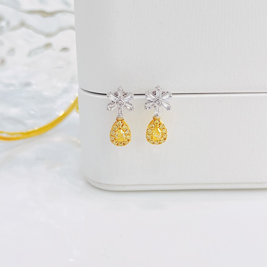 Snowflake design pear cut lab grown yellow diamond earrings stud