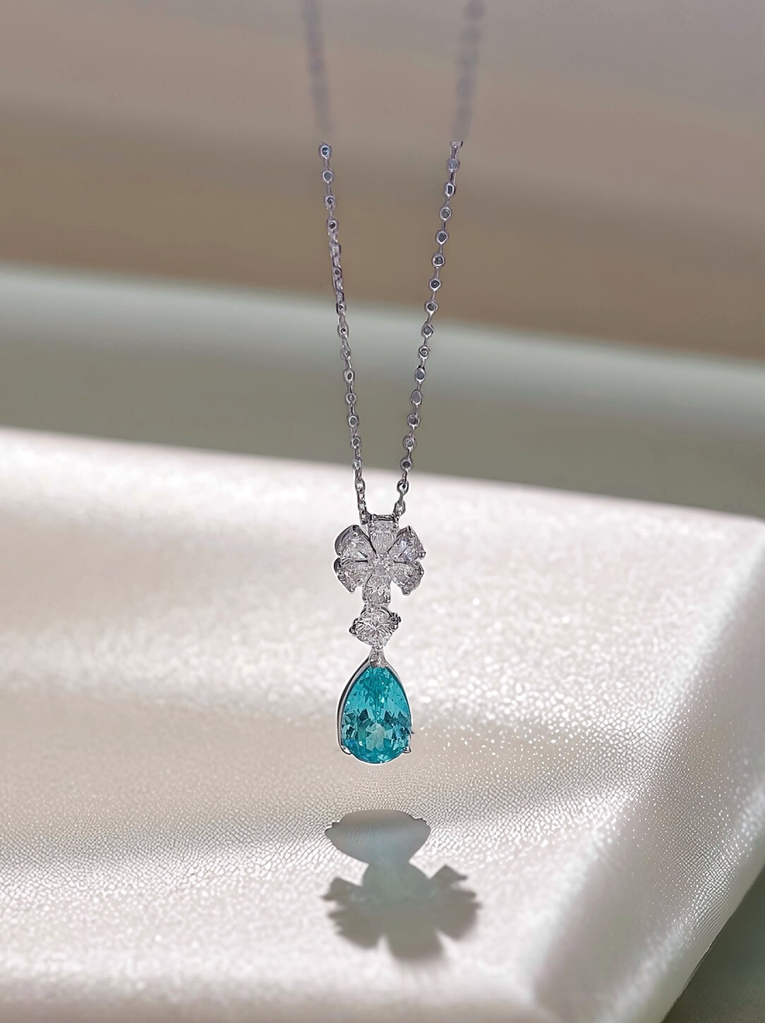 Snowflower design pear cut lab grown paraiba pendant necklace