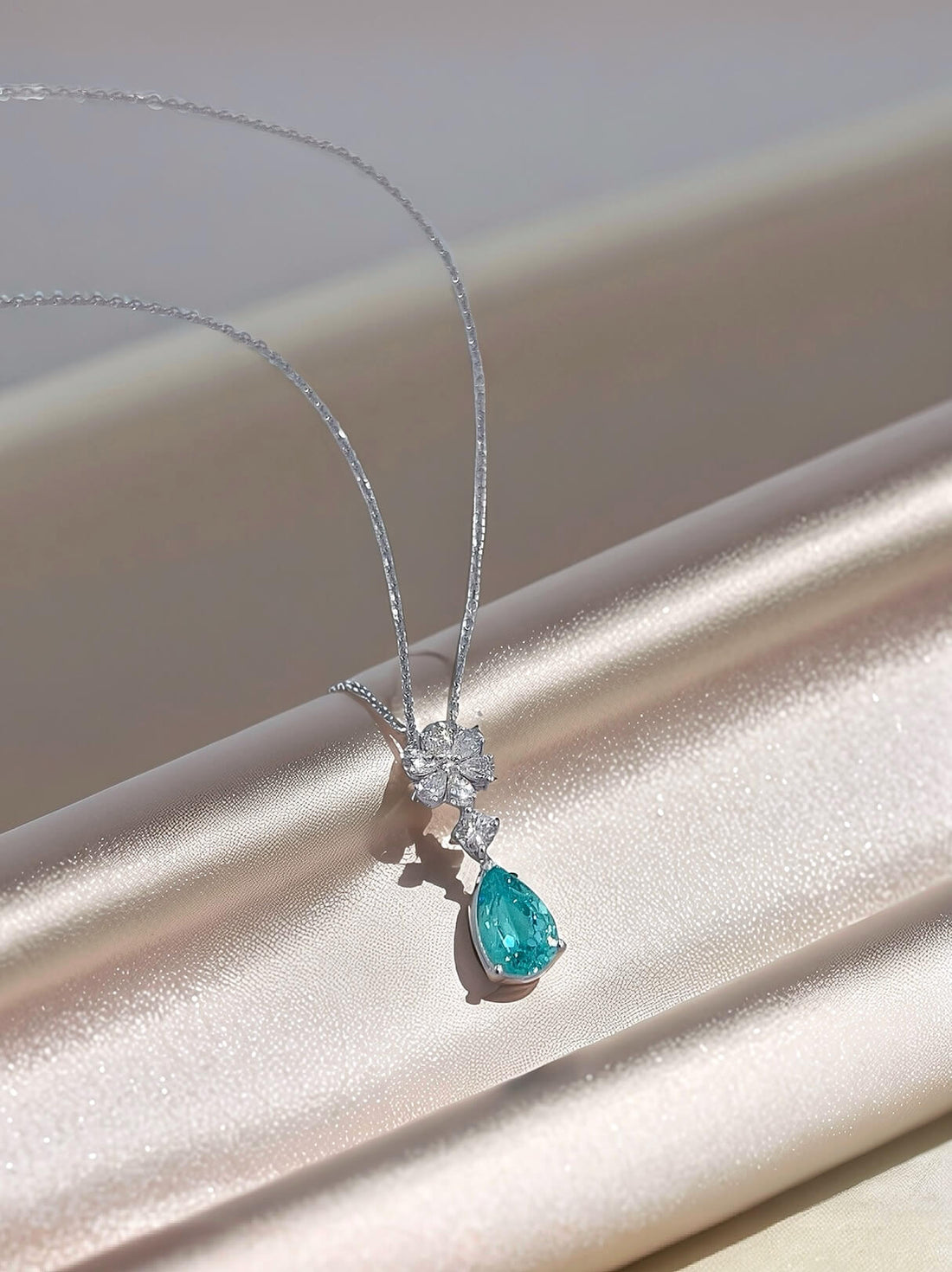 Snowflower design pear cut lab grown paraiba pendant necklace