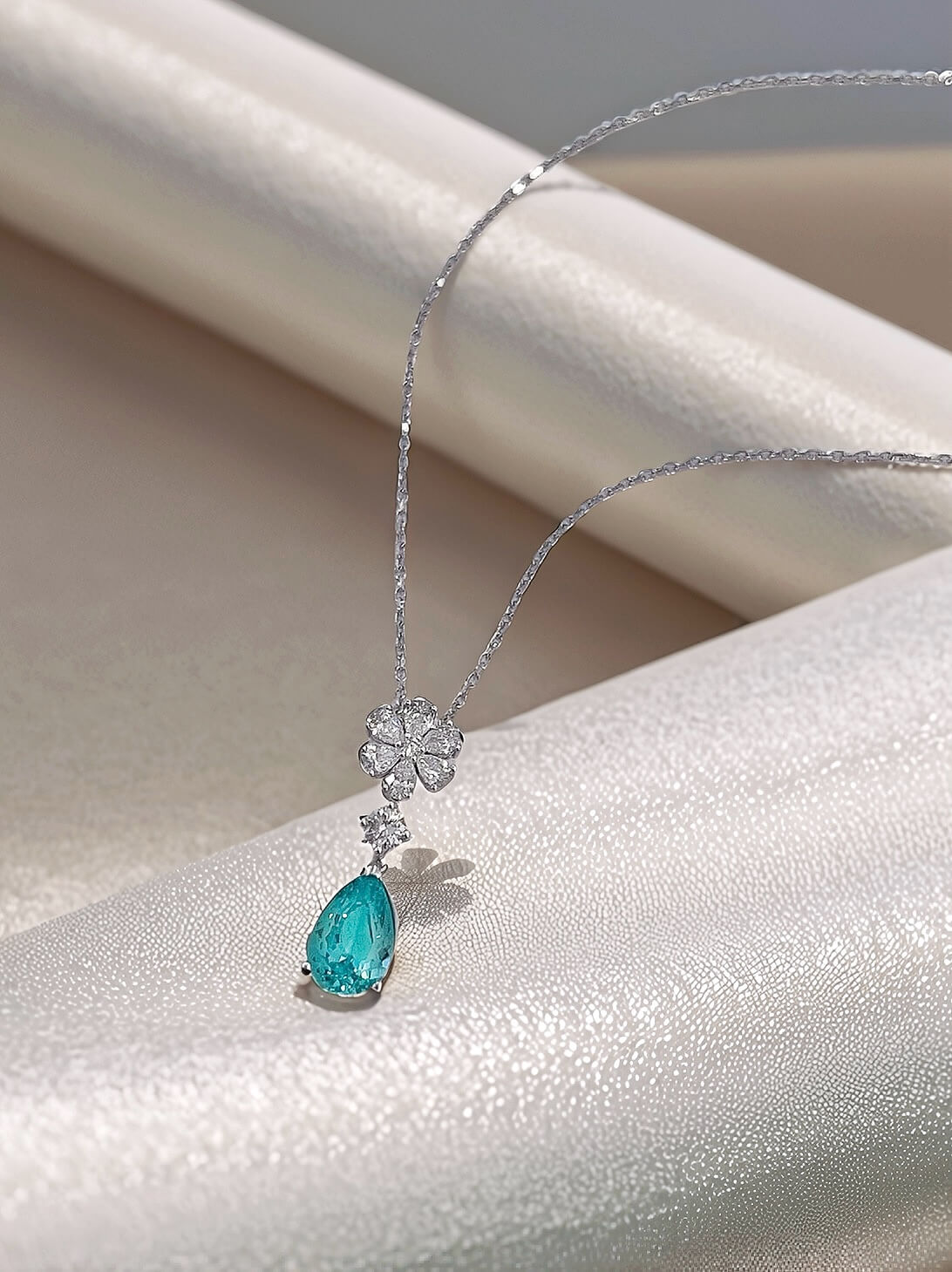 Snowflower design pear cut lab grown paraiba pendant necklace