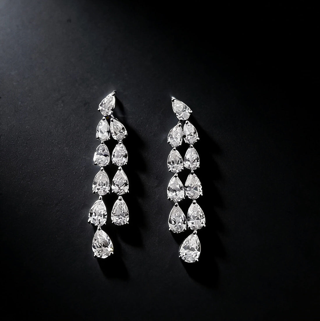 Tassel design pear cut lab grown diamond earrings stud