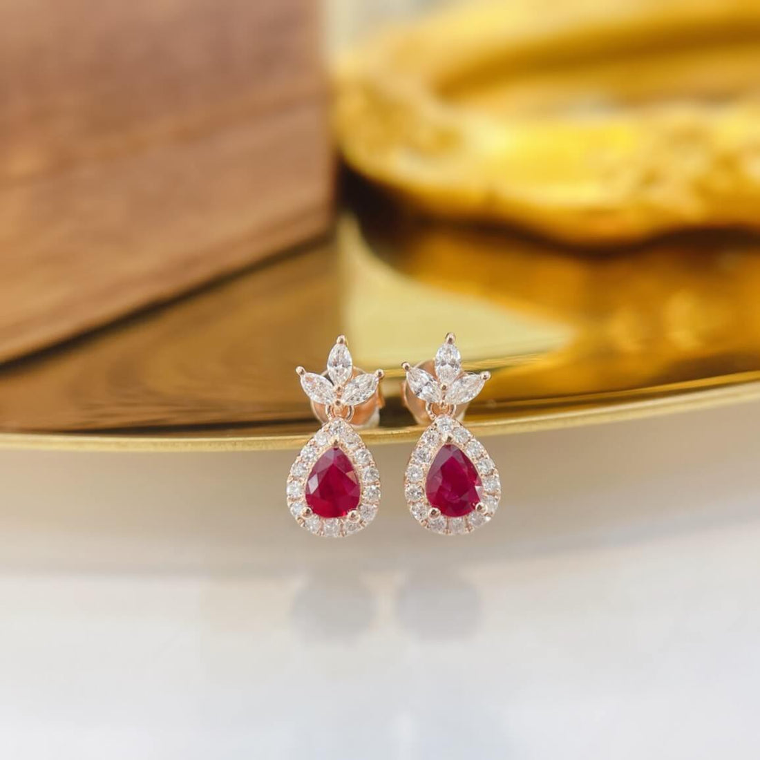 Three-leaf clover design pear cut lab grown ruby earrings stud