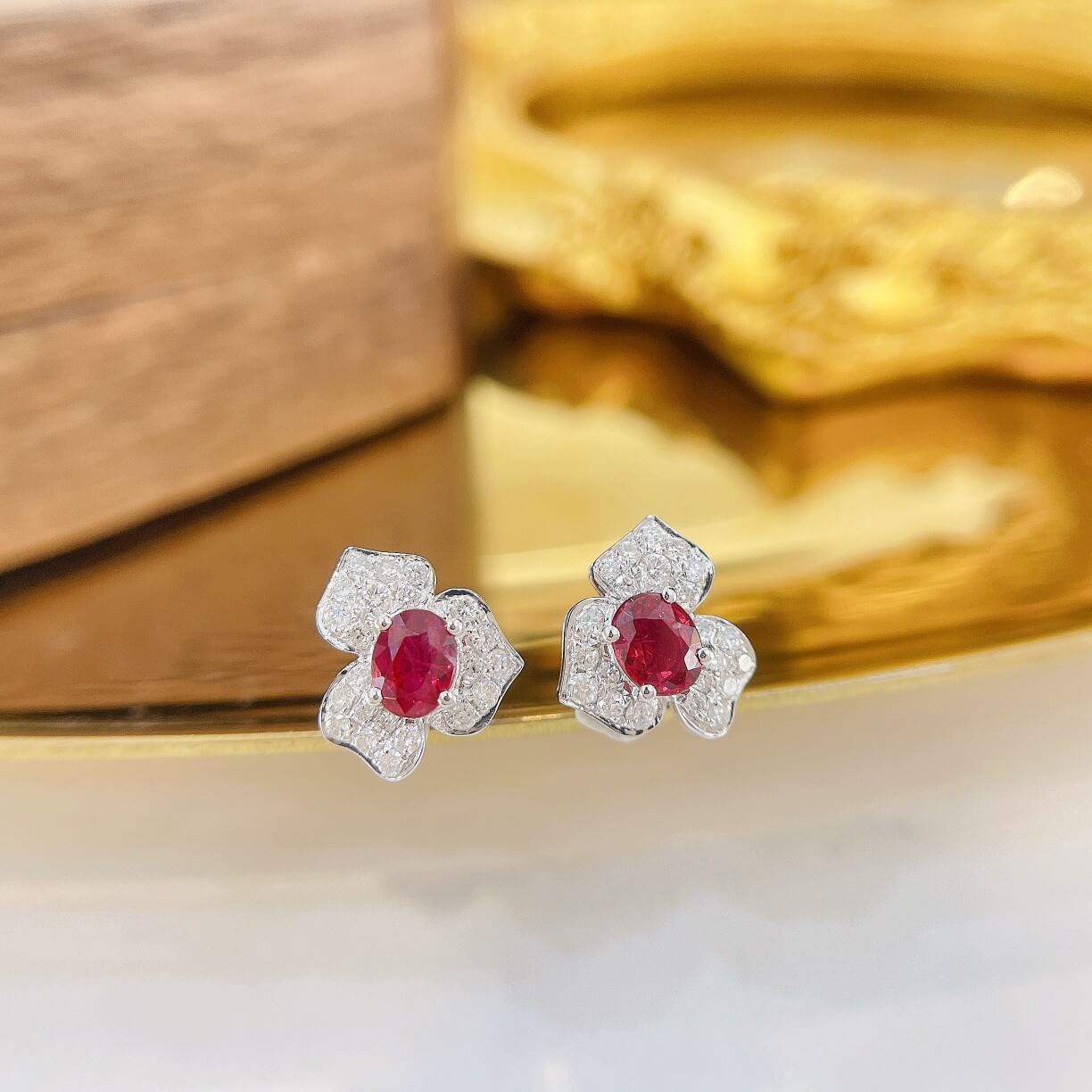 Three-petal flower oval cut lab grown ruby earrings stud