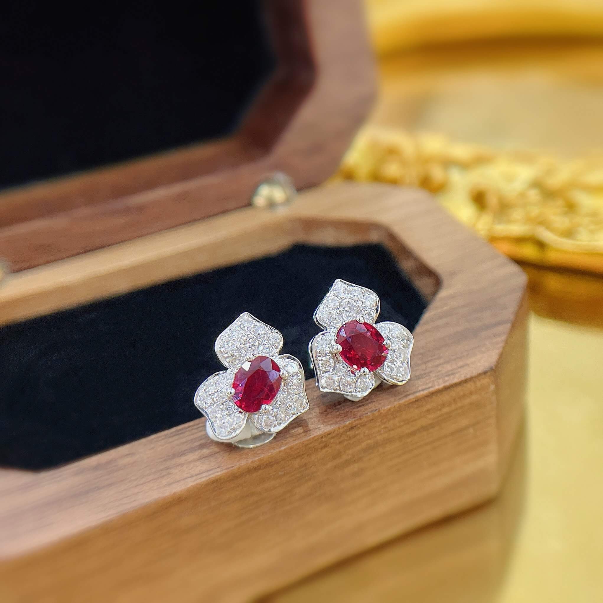 Three-petal flower oval cut lab grown ruby earrings stud